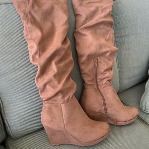 Thigh high wedged boots